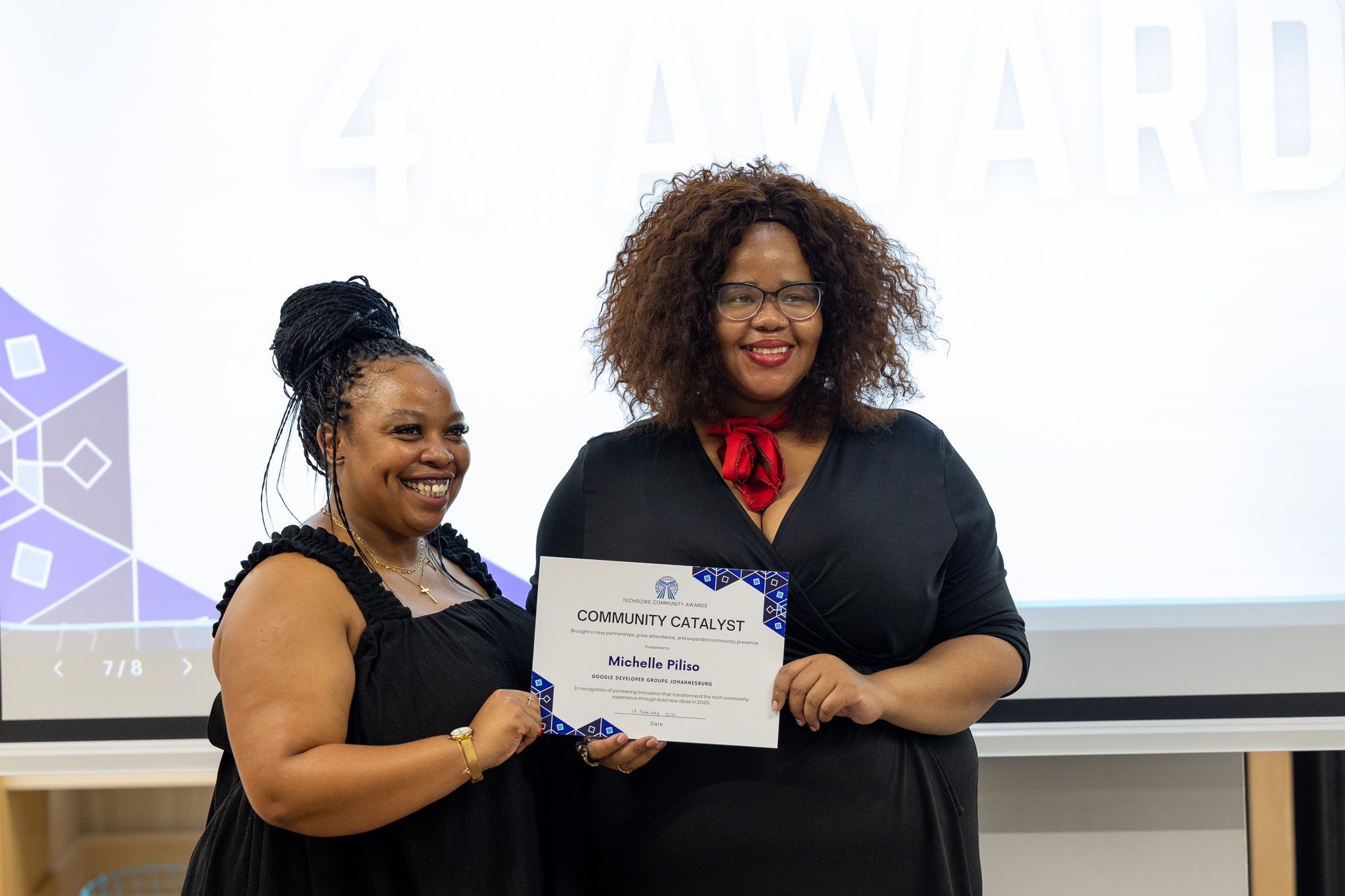 Michelle receiving Community Catalyst award